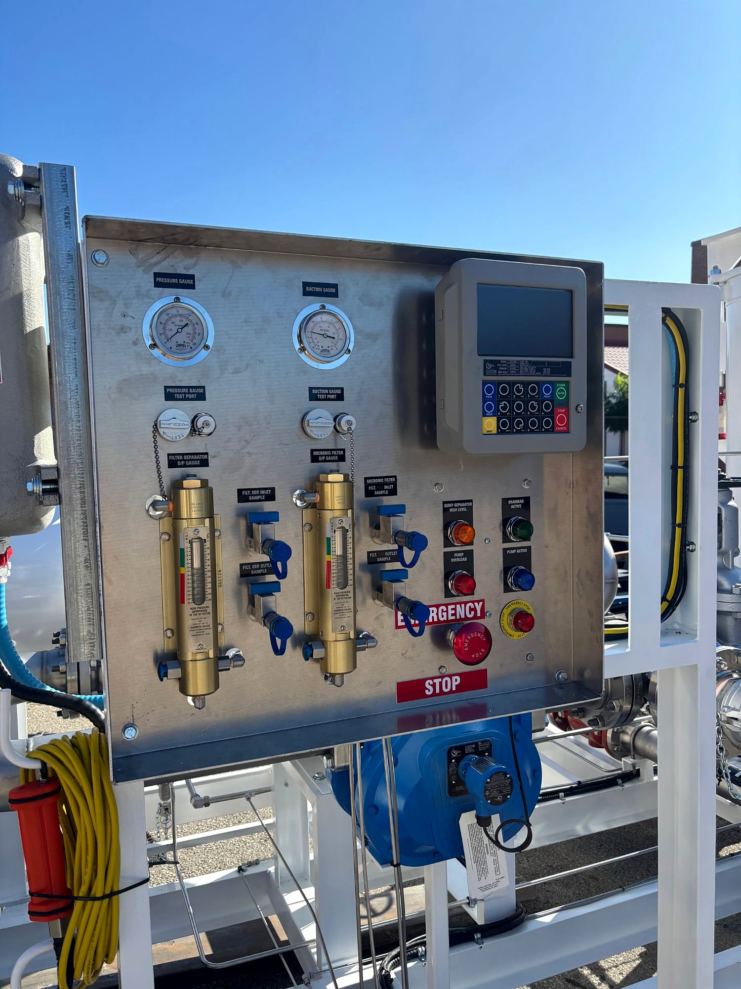Skid control panel with differential pressure gauges, sample points, meter register and emergency stop