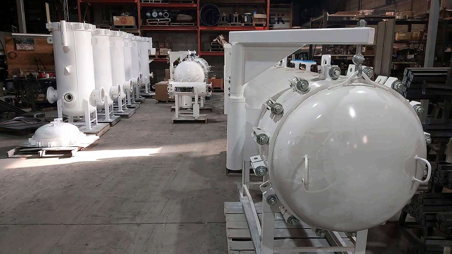 Filtration vessels in fabrication: sampling connections, differential pressure indication, air release and full drain provisions.