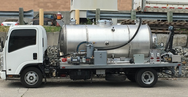 Hydrant cleaner truck side profile with stainless tank