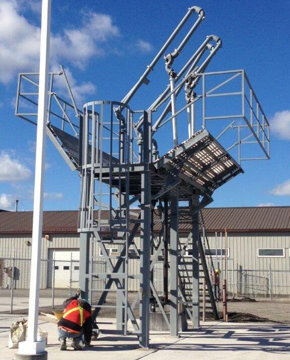 Loading arm rack platform with access stairs and operator platform